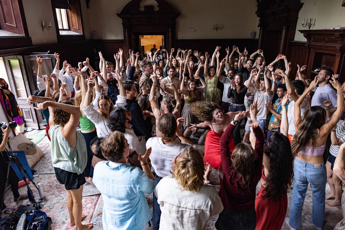 The whole room, hands up