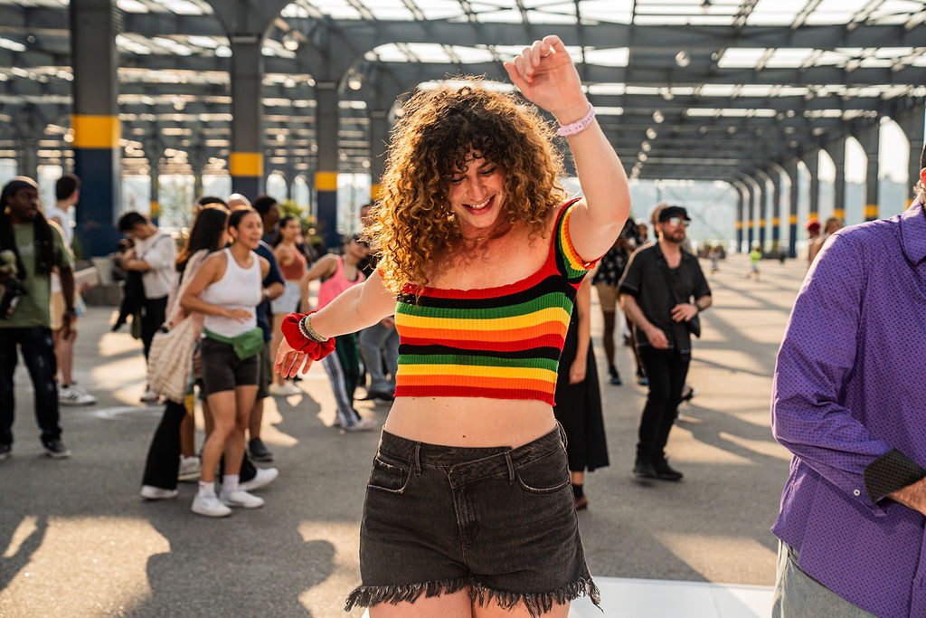 Kate Russell on a dance floor mid-movement