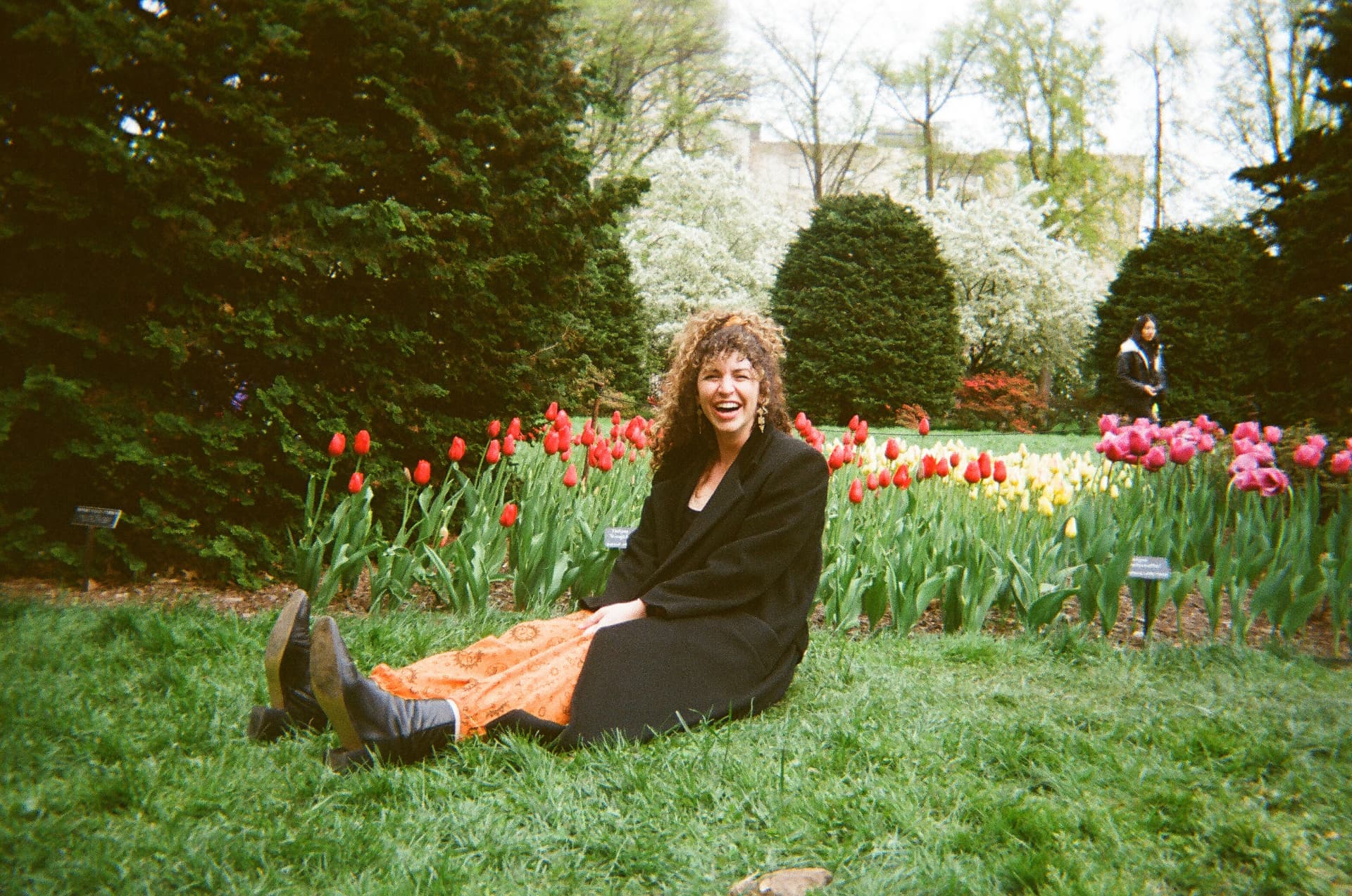 A park bench of tulips and strangers